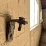 Loose masonry garage mount anchor in Phoenix garage